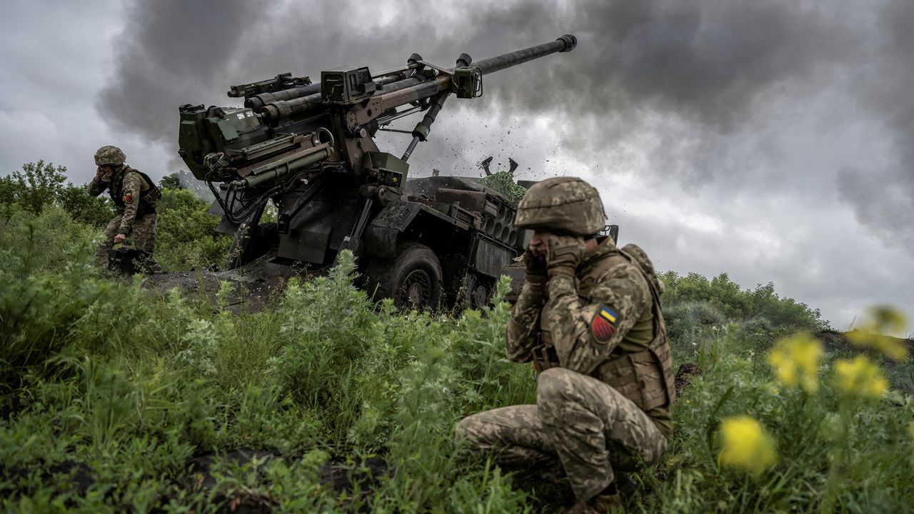 Ukrainian troops fire a Caesar self-propelled howitzer towards Russian forces near the town of Avdiivka in the Donetsk region.