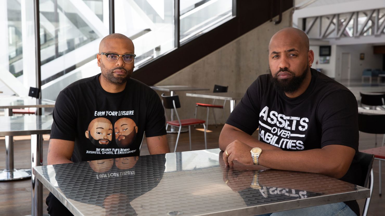 Troy Millings, right, and Rashad Bilal pose for a portrait in Atlanta on June 2, 2023. Rashad Bilal and Troy Millings started their educational platform "Earn Your Leisure" to close the racial wealth gap by sharing information about budgeting, starting a business and investing.