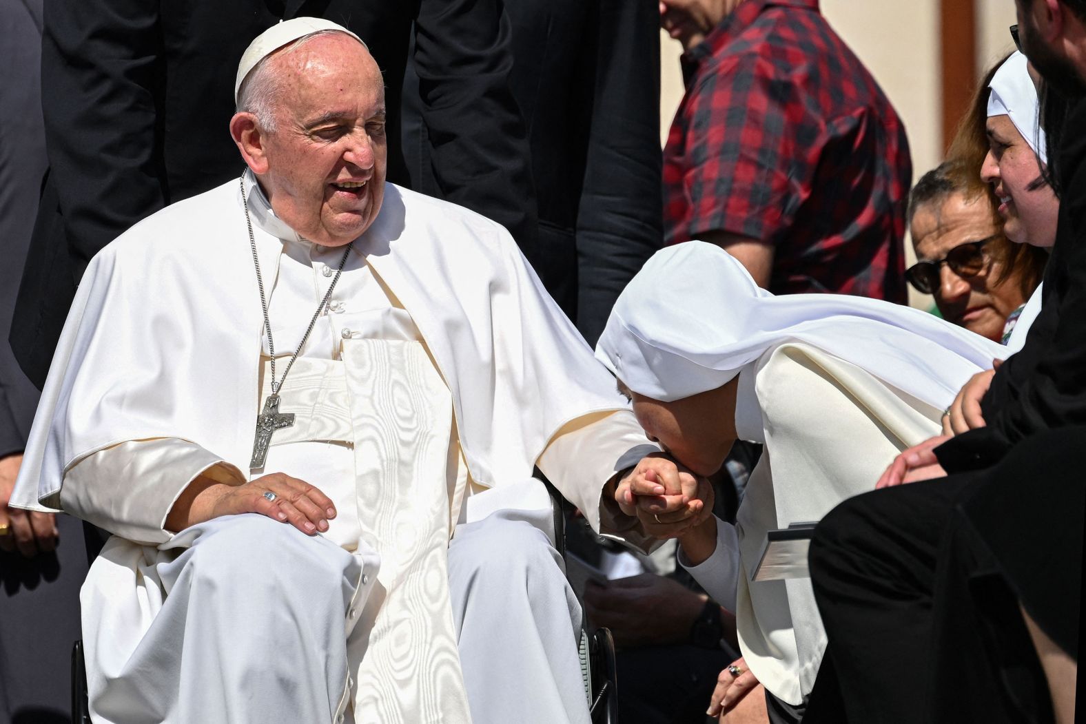 A nun kisses the hand of Pope Francis at the Vatican's St. Peter's Square on Wednesday, June 7. <a href="https://www.cnn.com/2023/06/07/europe/pope-hospital-surgery-intl/index.html" target="_blank">The Pope later had abdominal surgery</a> to repair a hernia that the Vatican said was causing "recurrent, painful and worsening" symptoms.