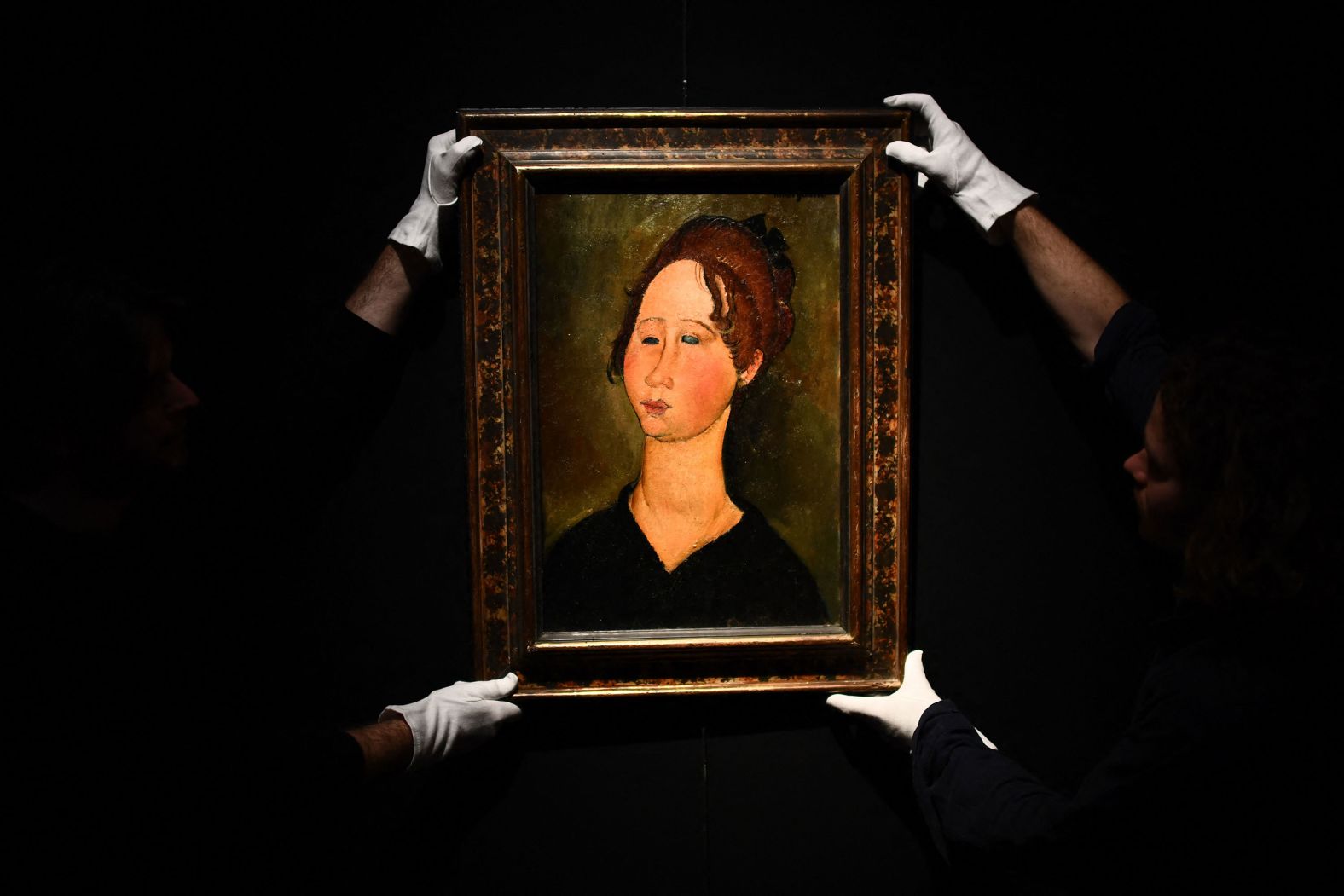 "La Bourguignonne," a 1918 oil painting by Amedeo Modigliani, is presented ahead of auction at the Hôtel Drouot in Paris on Friday, June 2.