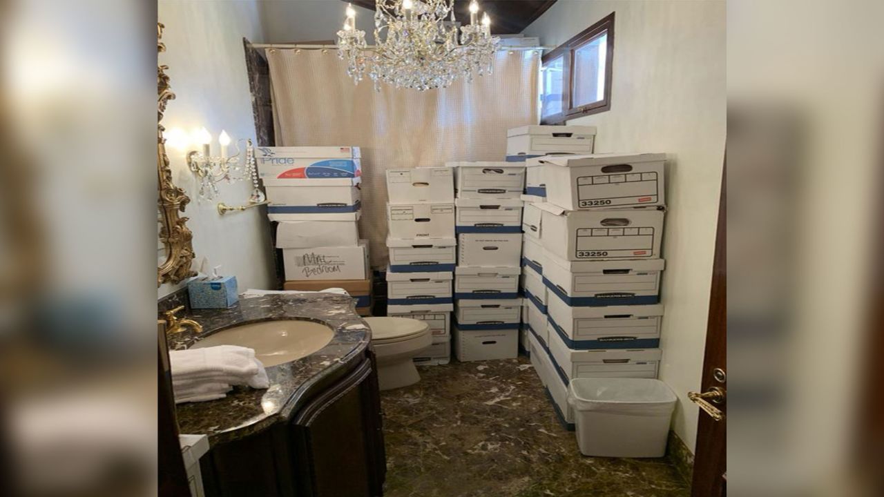 Boxes of documents are stored inside a bathroom and shower inside the Mar-a-Lago Club's Lake Room in this photo included in Donald Trump's federal indictment.