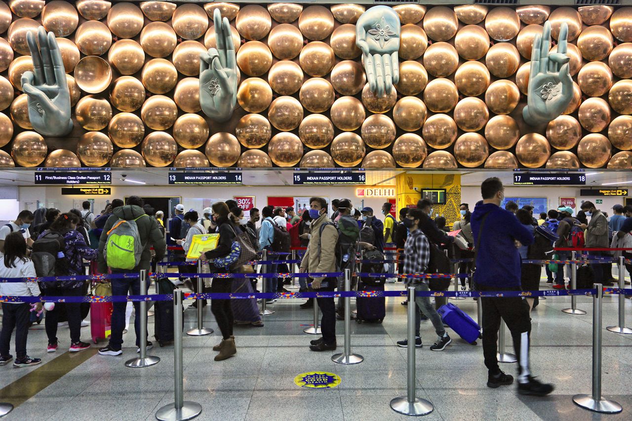 Mudras (hand gestures used in Indian classical dance, Buddhist meditation and yoga) are displayed along a wall above the customs clearance area at Indira Gandhi International Airport (Delhi Airport) in Delhi, India, on May 03, 2022. (Photo by Creative Touch Imaging Ltd./NurPhoto via Getty Images)