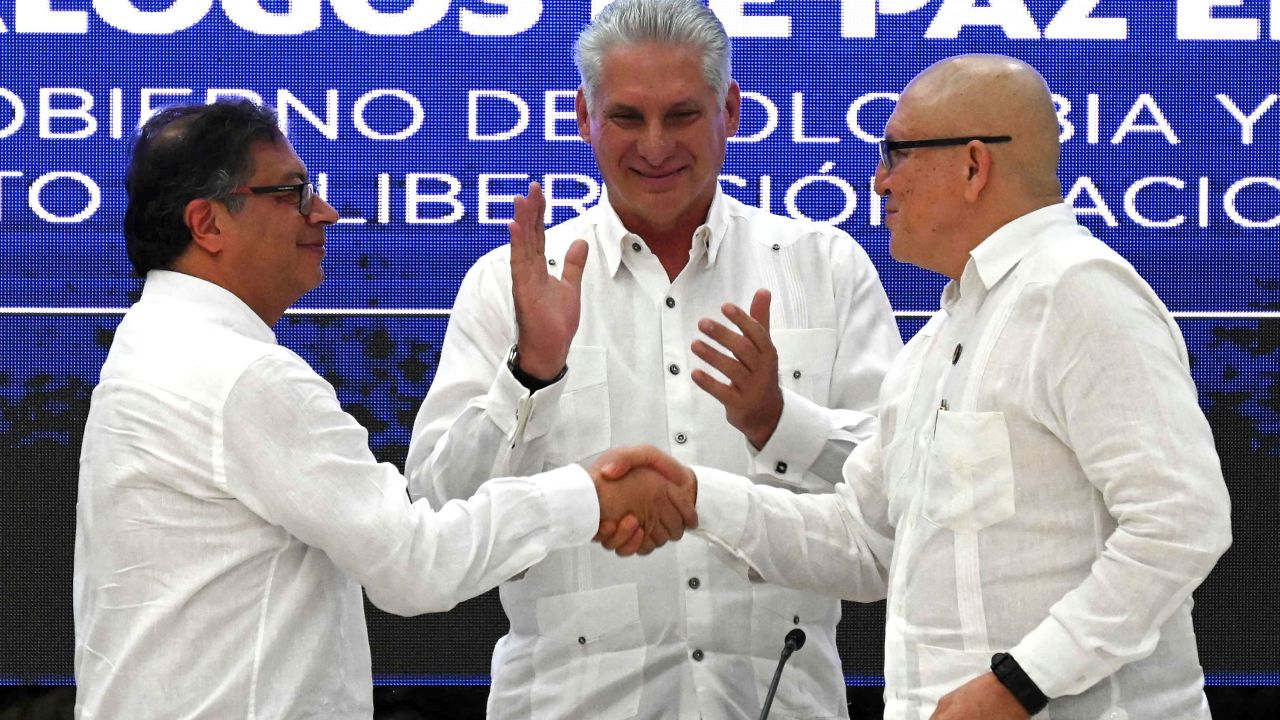 Colombian President Gustavo Petro (L) and ELN Guerrilla First Commander Antonio Garcia (R) shingle  hands adjacent  to Cuban President Miguel Diaz-Canel (center) successful  Havana, connected  June 9, 2023. 