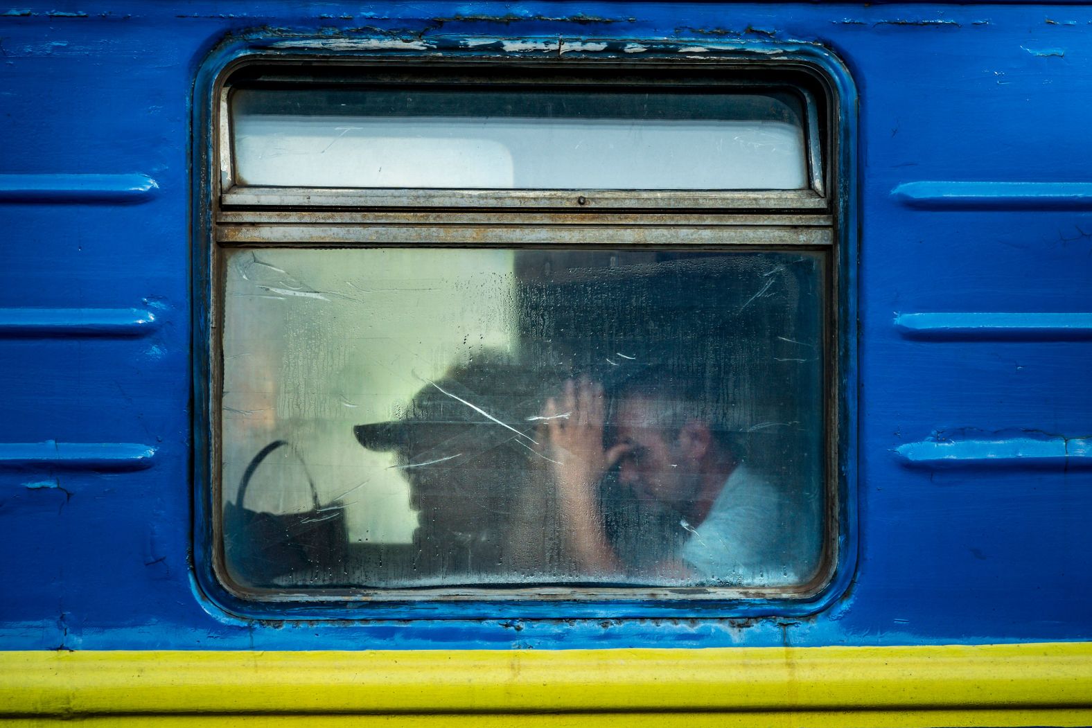 People evacuating Kherson arrive at a train station in Mykolaiv, Ukraine, on Thursday, June 8.