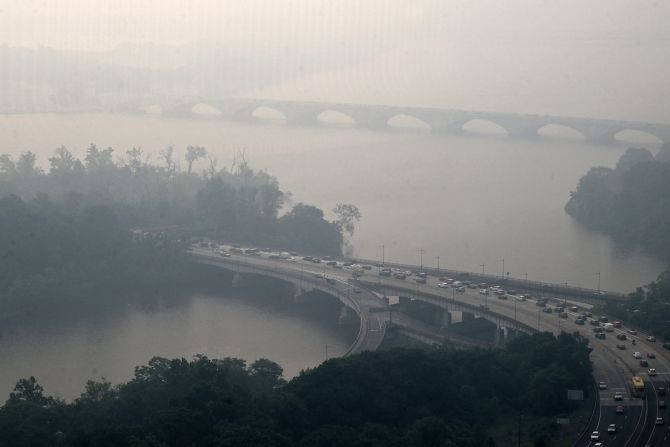 Traffic heads into Washington, DC, under hazy conditions on June 8.