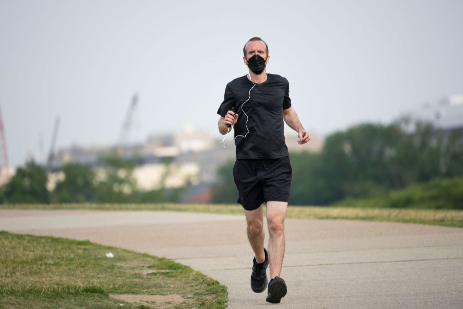 A jogger wears a face mask in Washington, DC, on June 9.