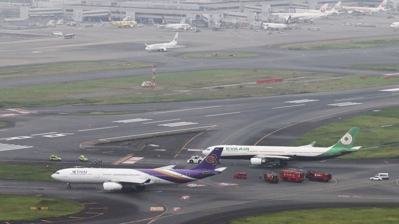 Two planes 'likely collided' at airport in Tokyo