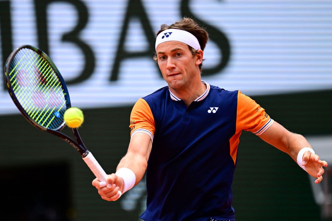 Norway's Casper Ruud plays a forehand return to Serbia's Novak Djokovic during their men's singles final match on day fifteen of the Roland-Garros Open tennis tournament at the Court Philippe-Chatrier in Paris on June 11, 2023.