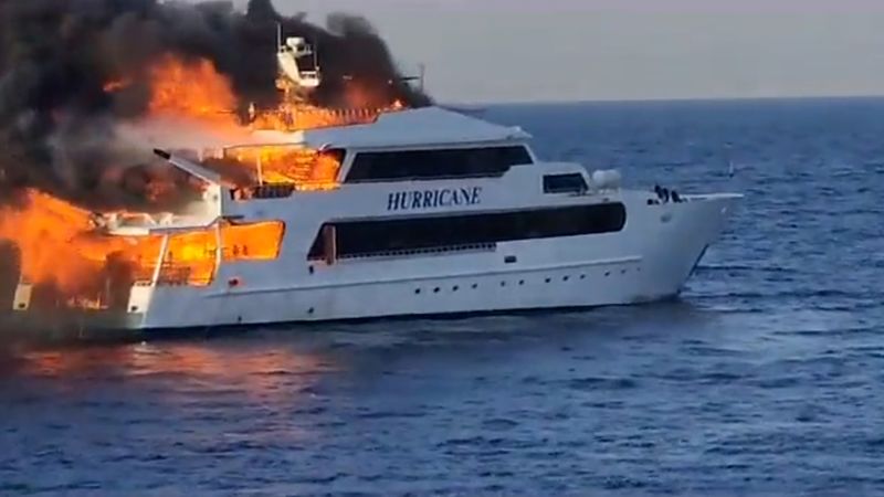 NextImg:Three British tourists missing after Egypt boat catches fire with 27 people on board | CNN