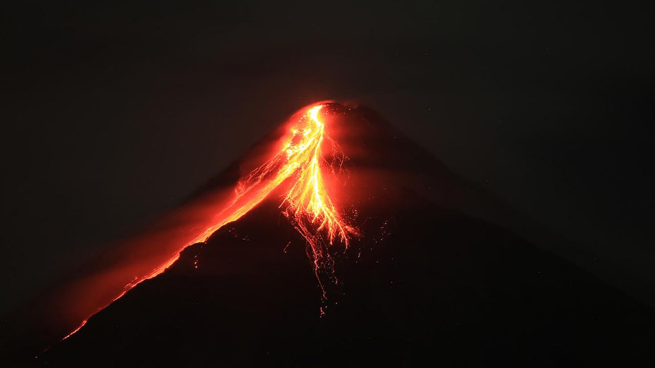 Mount Mayon spews lava during an eruption near Legazpi city in Albay province, south of Manila on June 11, 2023.