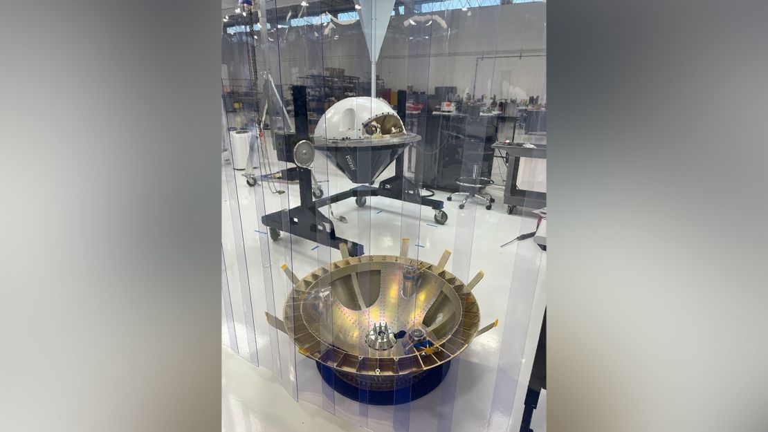 Varda's capsule, a test article of which is shown in the rear of this image, is set to launch on a SpaceX rocket June 12.