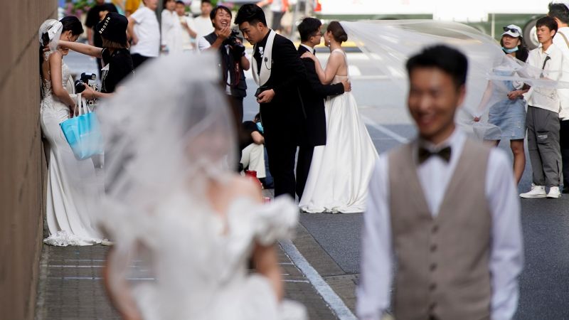 NextImg:China records fewest marriages in more than three decades as population crisis looms | CNN