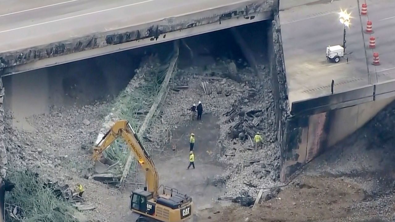 A screen grab from video provided by WPVI-TV/6ABC shows the collapsed section of I-95 as crews continue to work on the scene in Philadelphia on Monday.