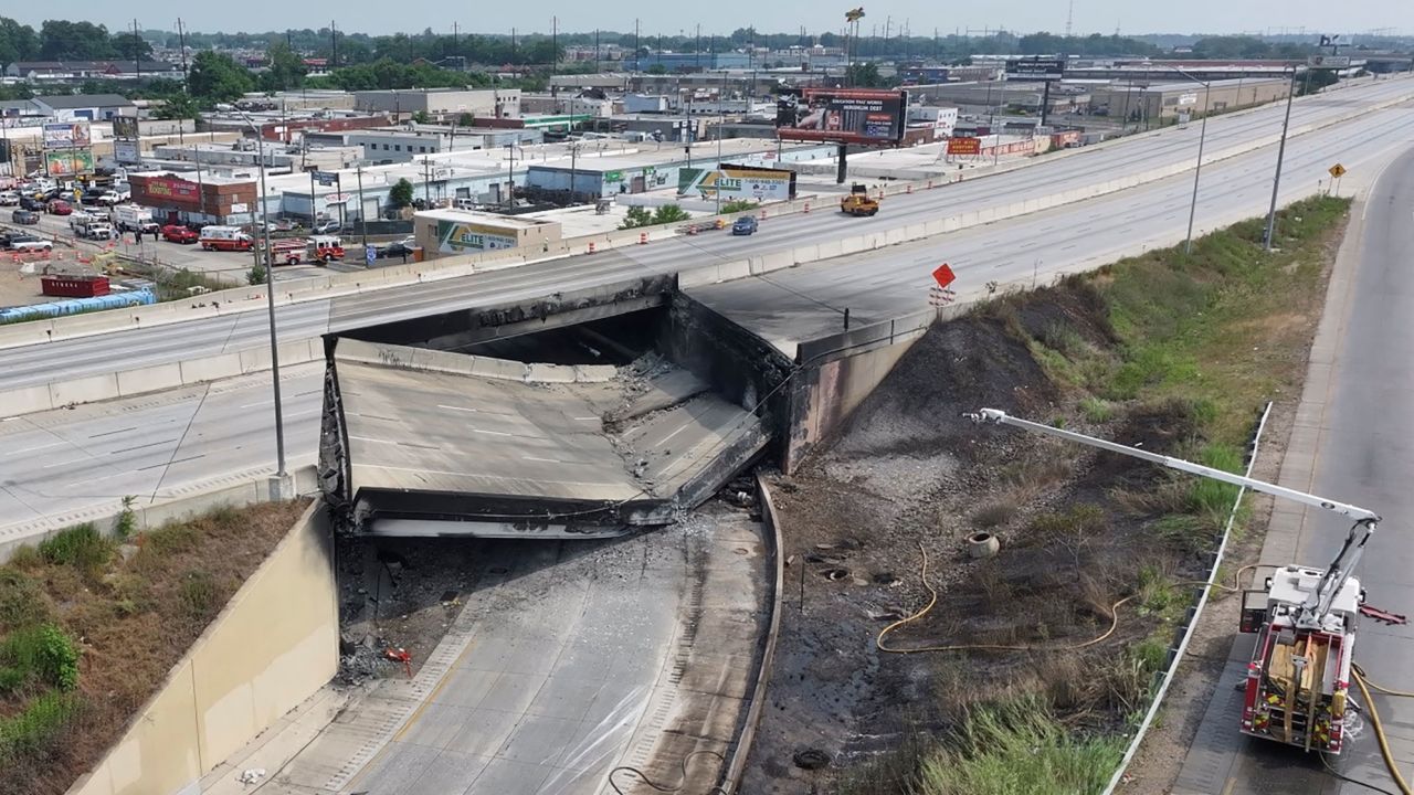 The collapsed section of Interstate 95 is seen in this still image obtained from a social media video. 