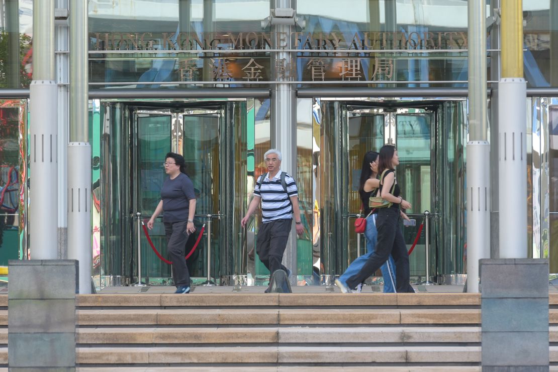 People walk past the Hong Kong Monetary Authority (HKMA) on May 4, 2023, in Hong Kong, China. 