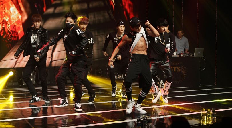 BTS was marketed as a hip-hop act when they debuted in 2013. Scroll through the gallery to see how the K-pop group went global.