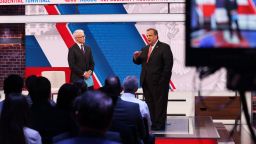 Former New Jersey Gov. Chris Christie, right, participates in a CNN town hall in New York on June 12, 2023, as host Anderson Cooper looks on.