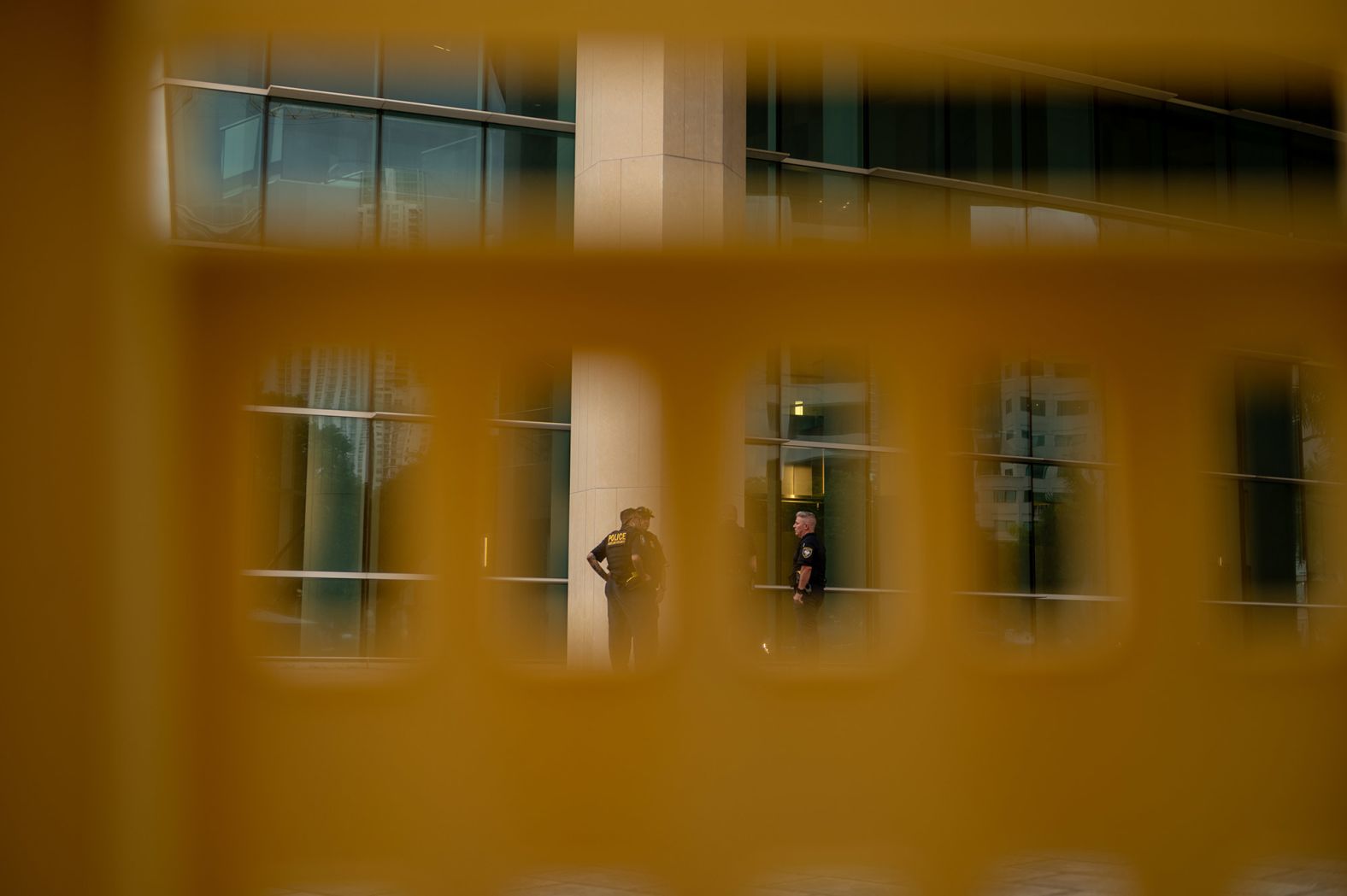 Law enforcement officers stand outside of the courthouse on Monday, June 12.