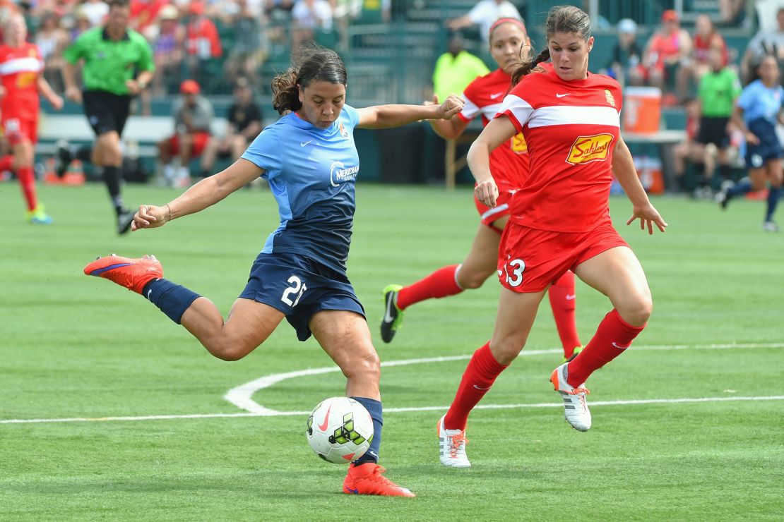 ROCHESTER, NY - JULY 19: Samantha Kerr #20 of the Sky Blue FC shoots the ball around Brittany Taylor #13 of the Western New York Flash during the first half at Sahlen's Stadium on July 19, 2015 in Rochester, New York. The Sky Blue FC and the Western New York Flash played to a 0-0 draw.