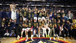 DENVER, CO - JUNE 12: The Denver Nuggets pose for a photo with the Larry O'Brien and Bill Russell MVP trophies after winning Game Five of the 2023 NBA Finals on June 12, 2023 at Ball Arena in Denver, Colorado. NOTE TO USER: User expressly acknowledges and agrees that, by downloading and or using this Photograph, user is consenting to the terms and conditions of the Getty Images License Agreement. Mandatory Copyright Notice: Copyright 2023 NBAE (Photo by Jesse D. Garrabrant/NBAE via Getty Images)