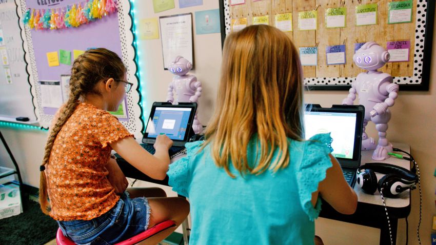 Kids using a social emotional teaching robot called ABii in a classroom in Missouri.