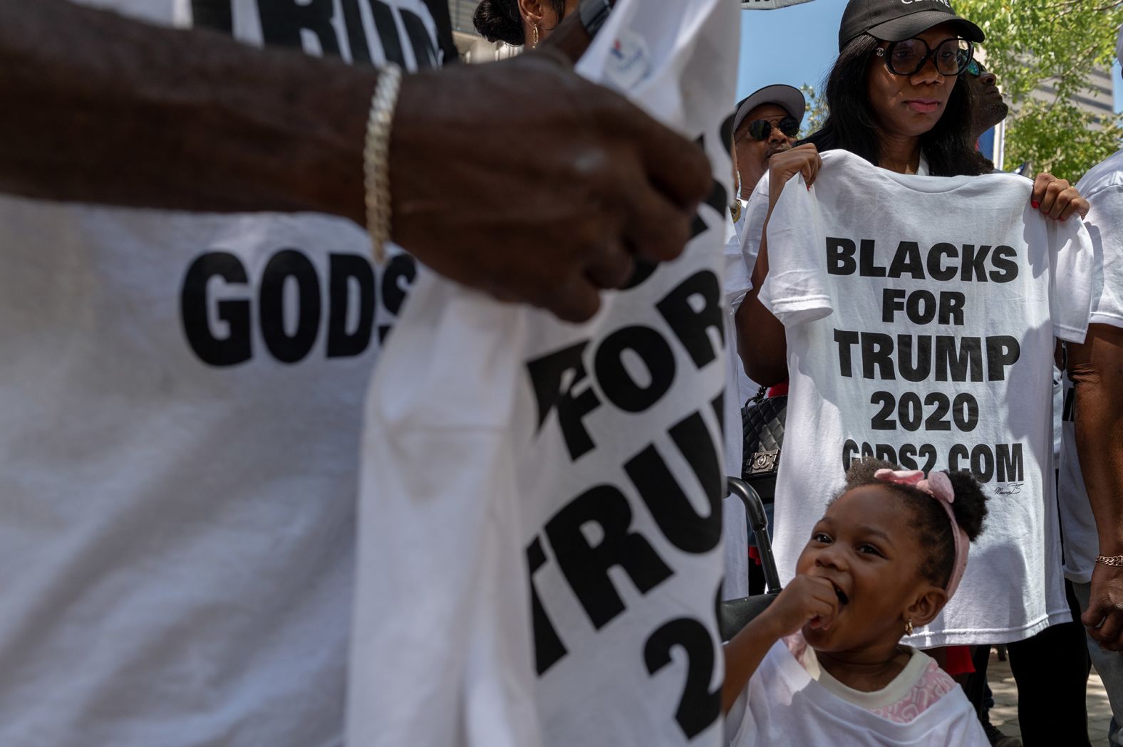Trump supporters stand outside the courthouse on June 13.