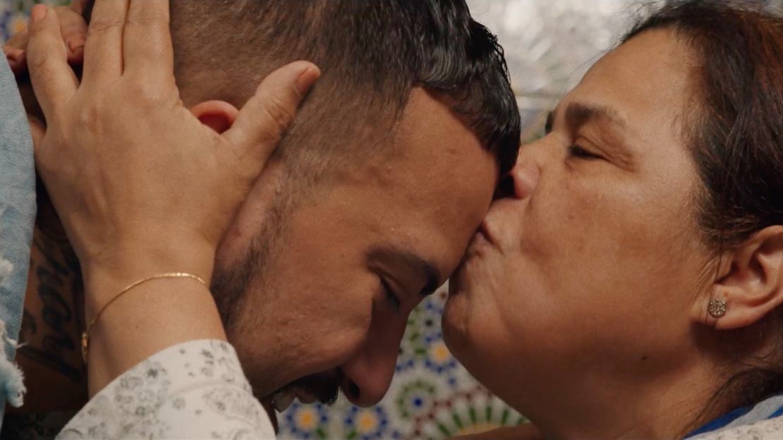 Khadija kisses her son French Montana on the forehead, in an image from "For Khadija."