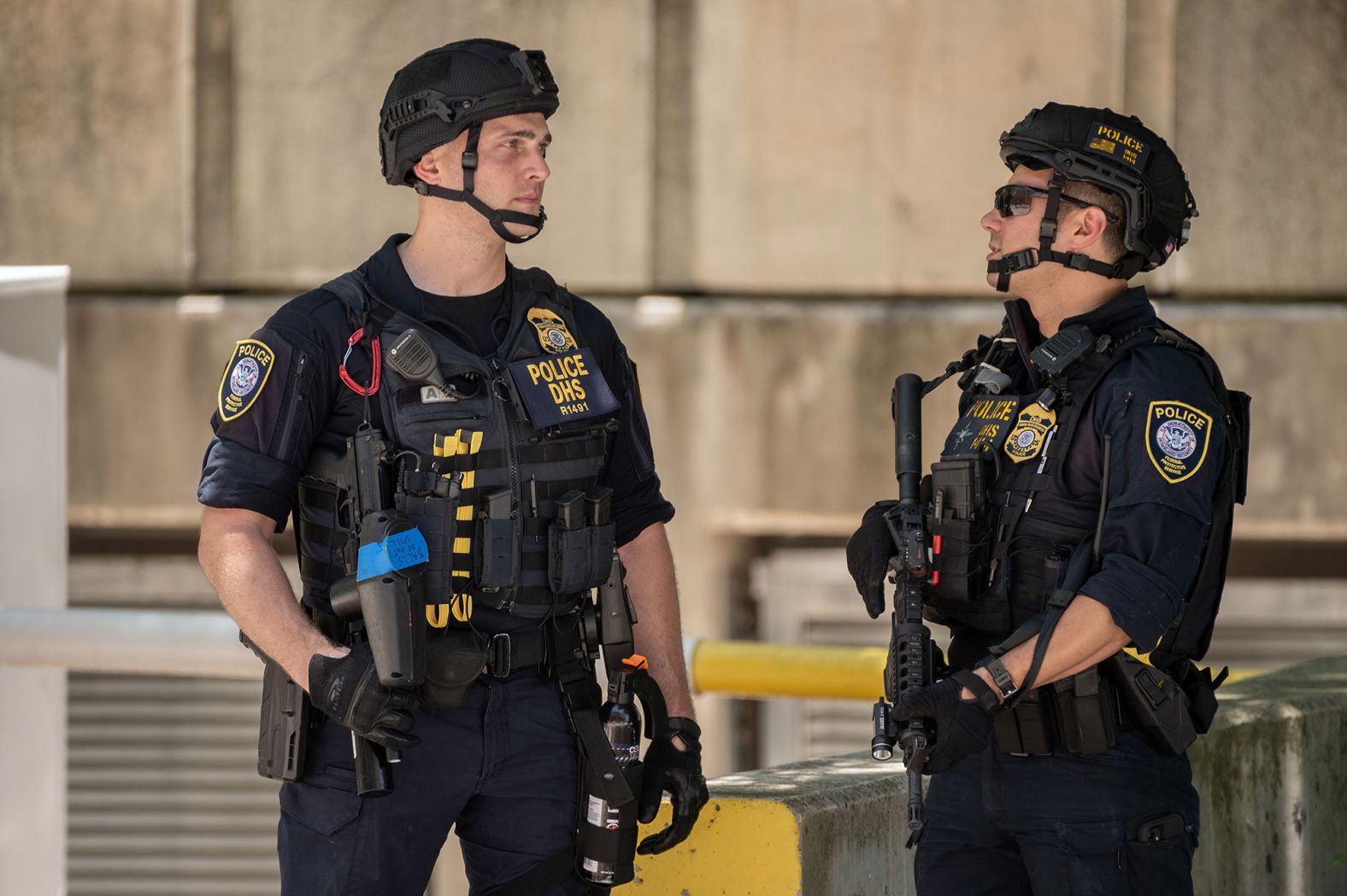 Law enforcement officers stand outside the courthouse on June 13.