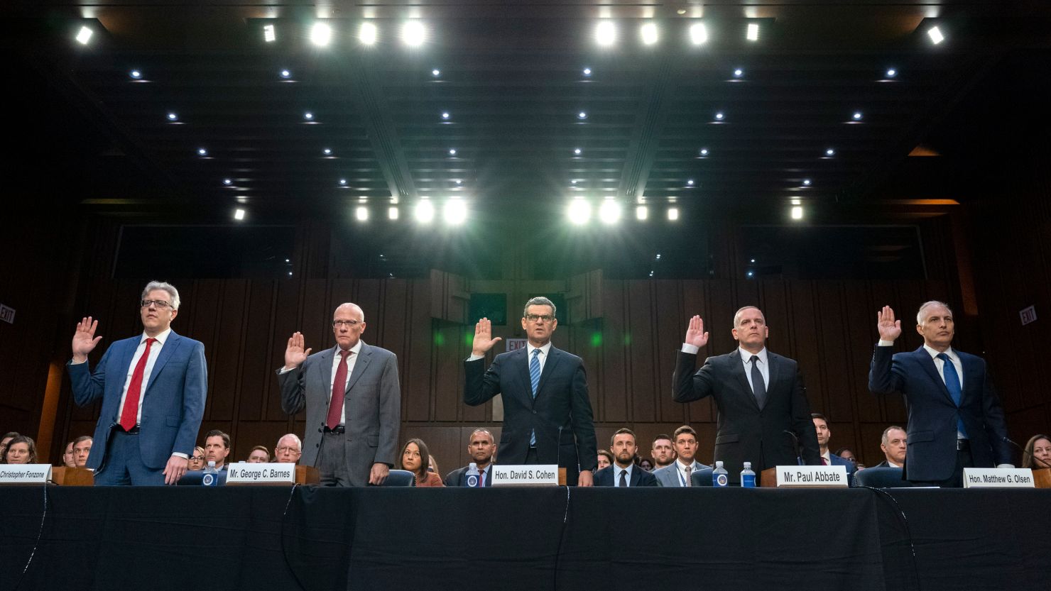 From left, Chris Fonzone, General Counsel at the Office of the Director of National Intelligence, George Barnes, Deputy Director of the National Security Agency, David Cohen, Deputy Director of the Central Intelligence Agency, Paul Abbate, Deputy Director of the Federal Bureau of Investigation, and Matt Olsen, Assistant Attorney General of the National Security Division of the Department of Justice, are sworn in before testifying at a Senate Judiciary Oversight Committee hearing to examine Section 702 of the Foreign Intelligence Surveillance Act and related surveillance authorities, Tuesday, June 13, 2023, on Capitol Hill in Washington. 