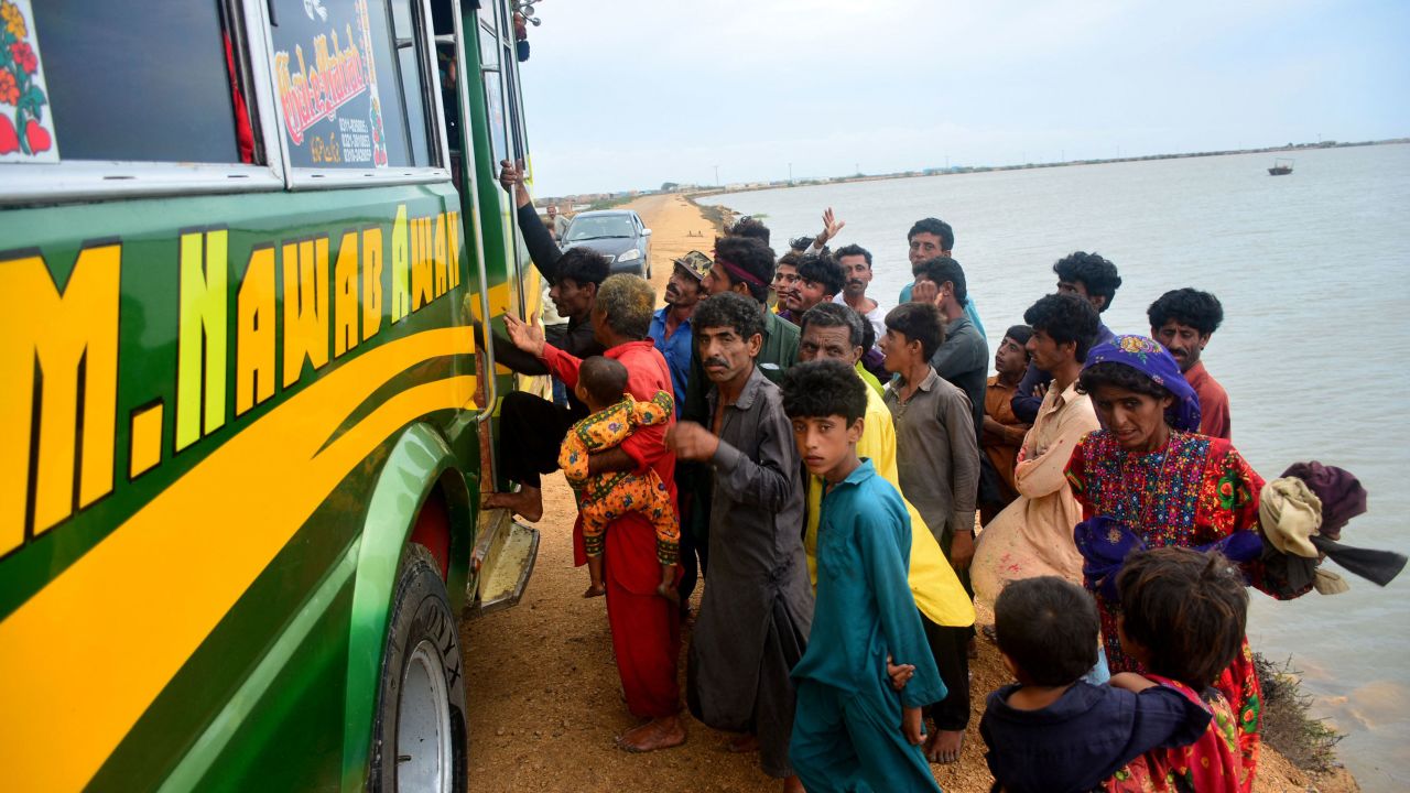 Residents are evacuated from a coastal area of Pakistan's Sindh province on June 13, 2023. 