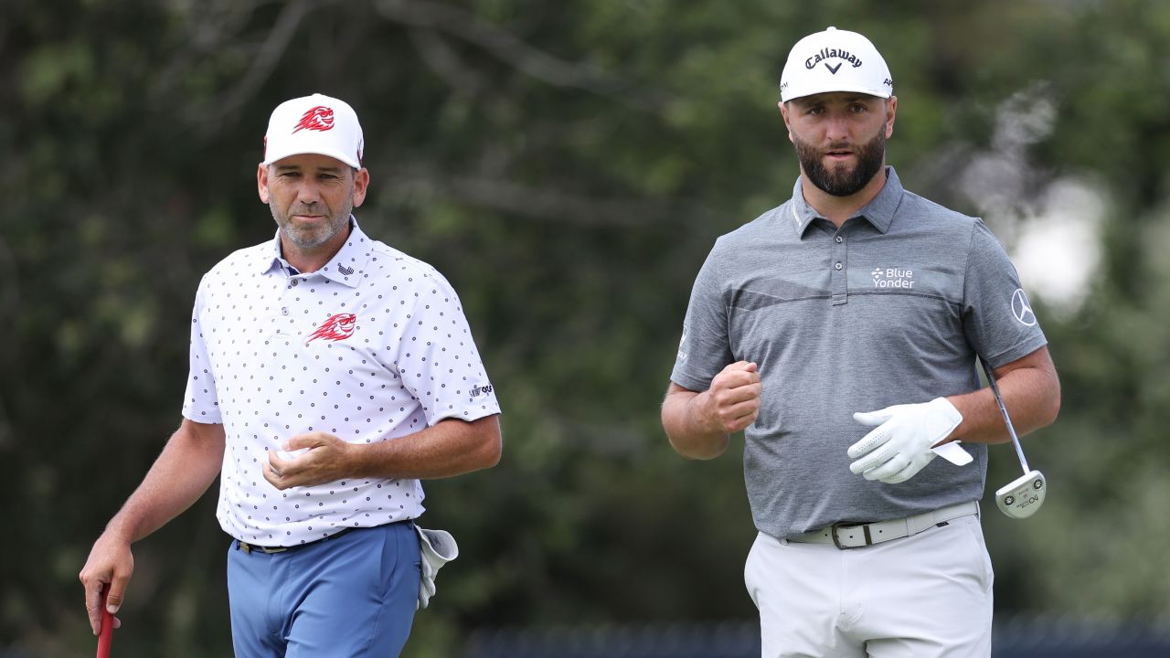 Rahm and Garcia (left) talk during a practice round prior to the 2023 US Open.