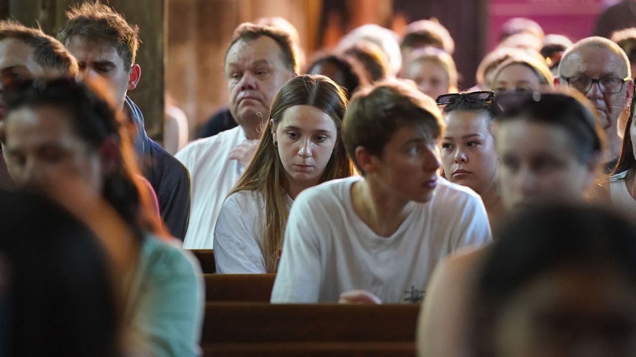 People attended a vigil at St Peter's Church in Nottingham on Tuesday.