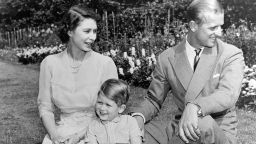 King Charles III as a young child with his parents, Queen Elizabeth II and Prince Philip.