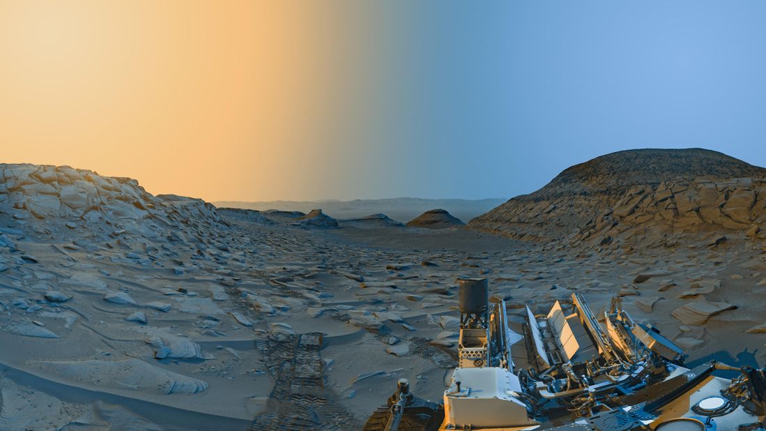 This composite panoramic image, shot by NASA's Curiosity Mars rover on April 8, 2023, shows the "Marker Band Valley" colorized and at different times of day.