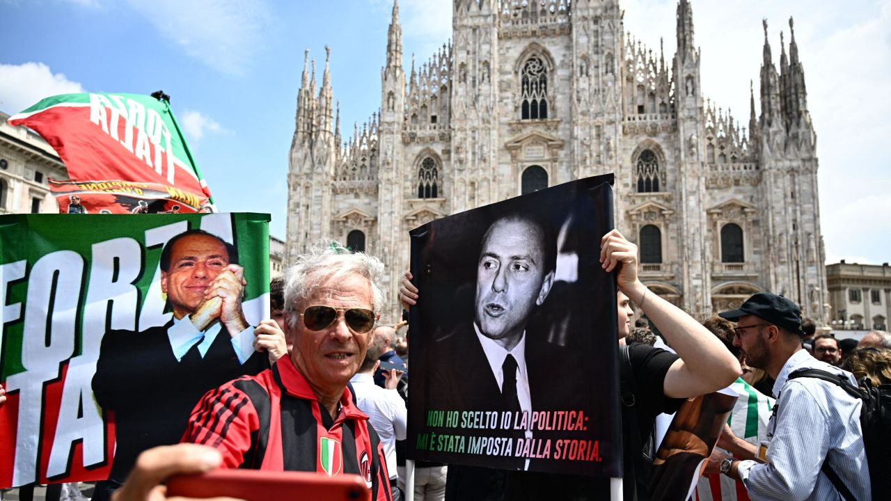 People assembled in Milan ahead of the service on Wednesday.