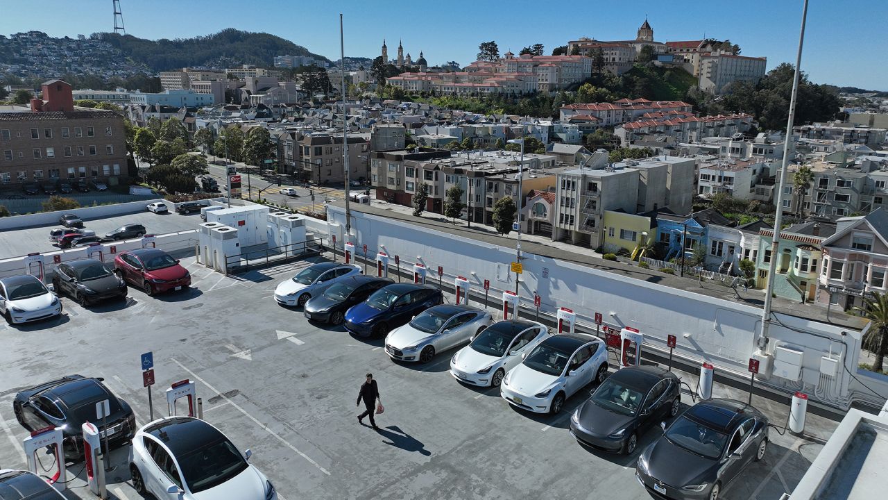 Tesla cars recharge at San Francisco charging station in February. 