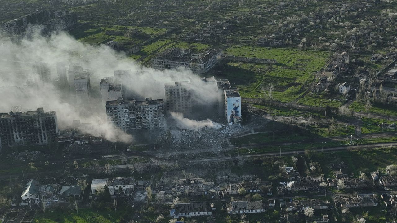 Smoke rises from buildings in this aerial view of Bakhmut, the site of the heaviest battles with the Russian troops in the Donetsk region, Ukraine, Wednesday, April 26, 2023. (AP Photo/Libkos)