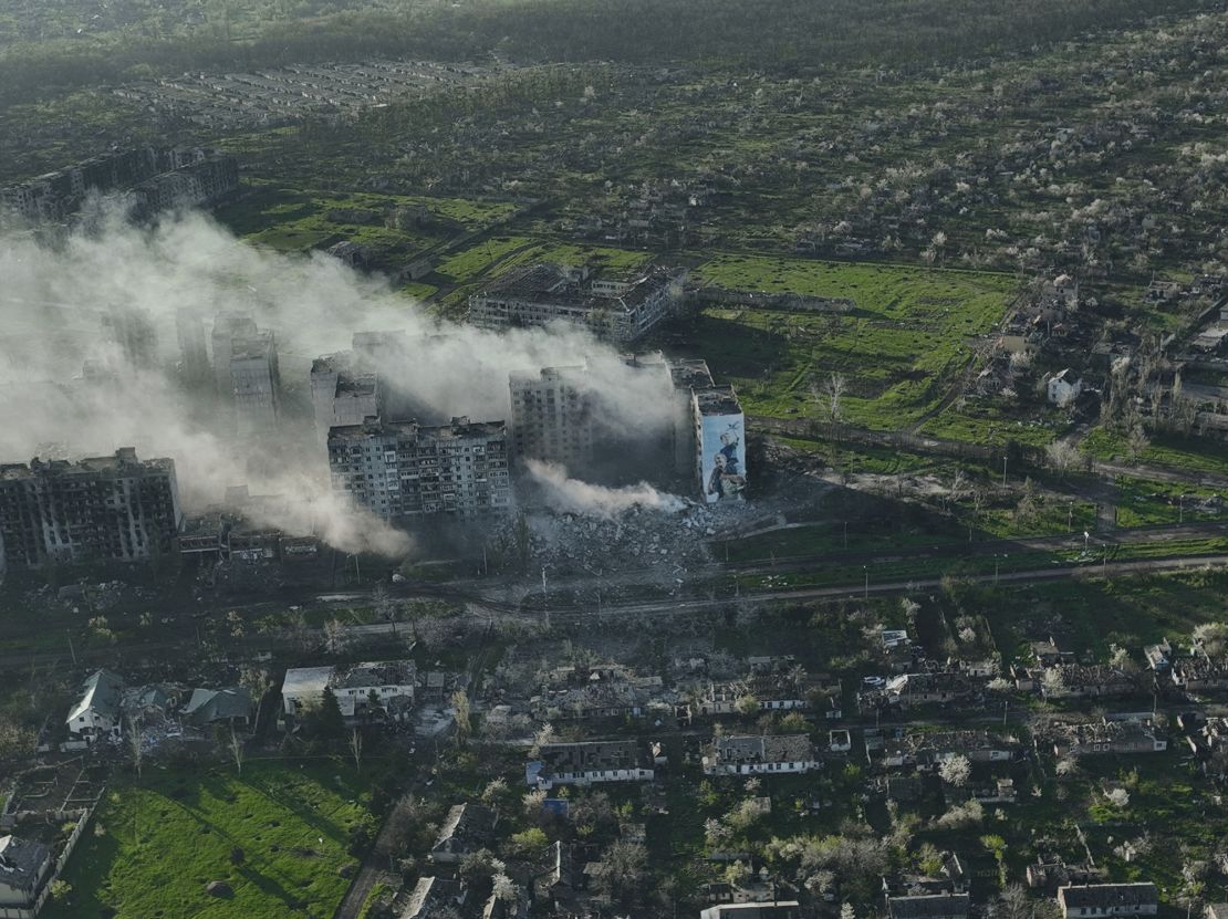 Smoke rises from buildings in this aerial view of Bakhmut, the site of the heaviest battles with the Russian troops in the Donetsk region, Ukraine, Wednesday, April 26, 2023. (AP Photo/Libkos)