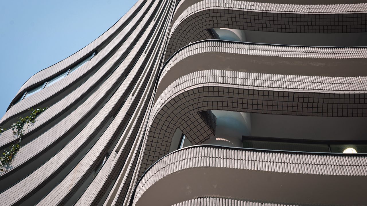 The wavy exterior of Shan Sum, a private columbarium tower in the Kwai Chung district of Hong Kong on June 2.