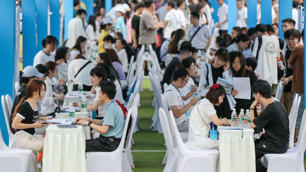 This photo taken on June 14, 2023 shows university graduates and youths attending a job fair in Yibin, in China's southwestern Sichuan province. Unemployment among Chinese youths jumped to a record 20.8 percent in May, the National Bureau of Statistics said on June 15, 2023, as the economy's post-Covid growth spurt fades. (Photo by CNS / AFP) / China OUT (Photo by -/CNS/AFP via Getty Images)