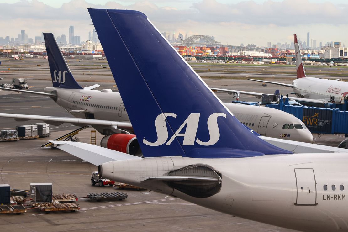 SAS Airlines planes are seen at Newark Liberty International Airport in Newark, New Jersey, United States, on October 26, 2022. (Photo by Beata Zawrzel/NurPhoto via Getty Images)