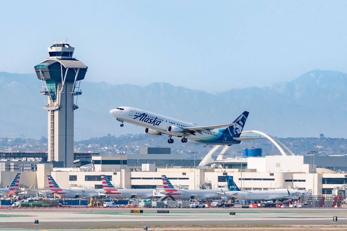 LOS ANGELES, CA - JULY 30: Alaska Airlines Boeing 737-990ER takes off from Los Angeles international Airport on July 30, 2022 in Los Angeles, California.  (Photo by AaronP/Bauer-Griffin/GC Images)
