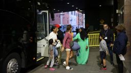 Migrants arriving from Texas by bus disembark at the Port Authority bus terminal in New York City, U.S., May 10, 2023. 