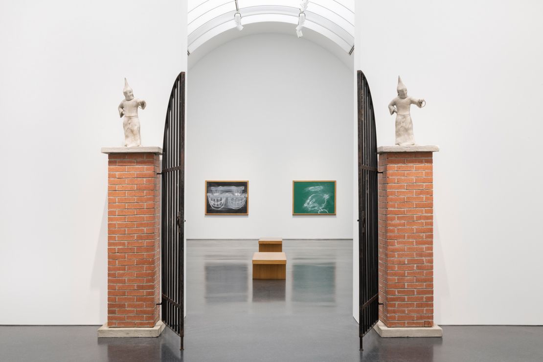 Simmons incorporated Klu Klux Klan iconography into a number of installations early in his career, such as “Klan Gate,” from 1992, making pointed implications about how white supremacy is embedded into society.