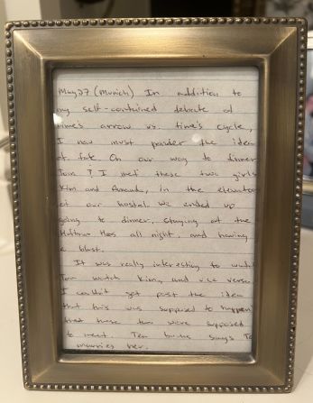 <strong>Capturing the moment</strong>: The following year, in September 1999, Kim and Tom got married. At their rehearsal dinner, John presented the couple with this framed page, torn from his 1998 travel journal, in which he'd described the moment they first met. "Ten bucks says Tom marries her," he wrote.