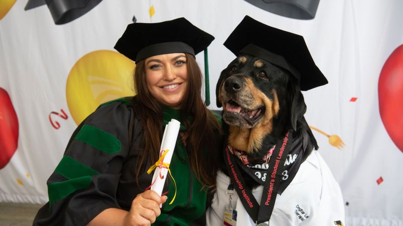 NextImg:Dedicated service and therapy dogs receive honorary 'dogtorate' degrees from the University of Maryland, Baltimore | CNN
