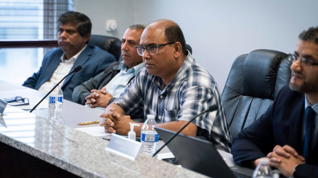 City council member Mohammed Hassan listens to public comment before the vote Tuesday.