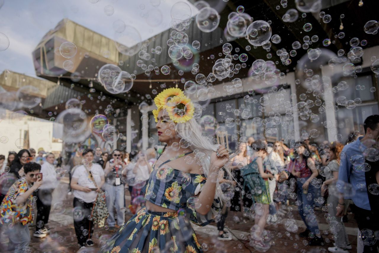 Soap bubbles float around a dancer during the Pride Parade in Pristina, Kosovo, on Saturday, June 10.