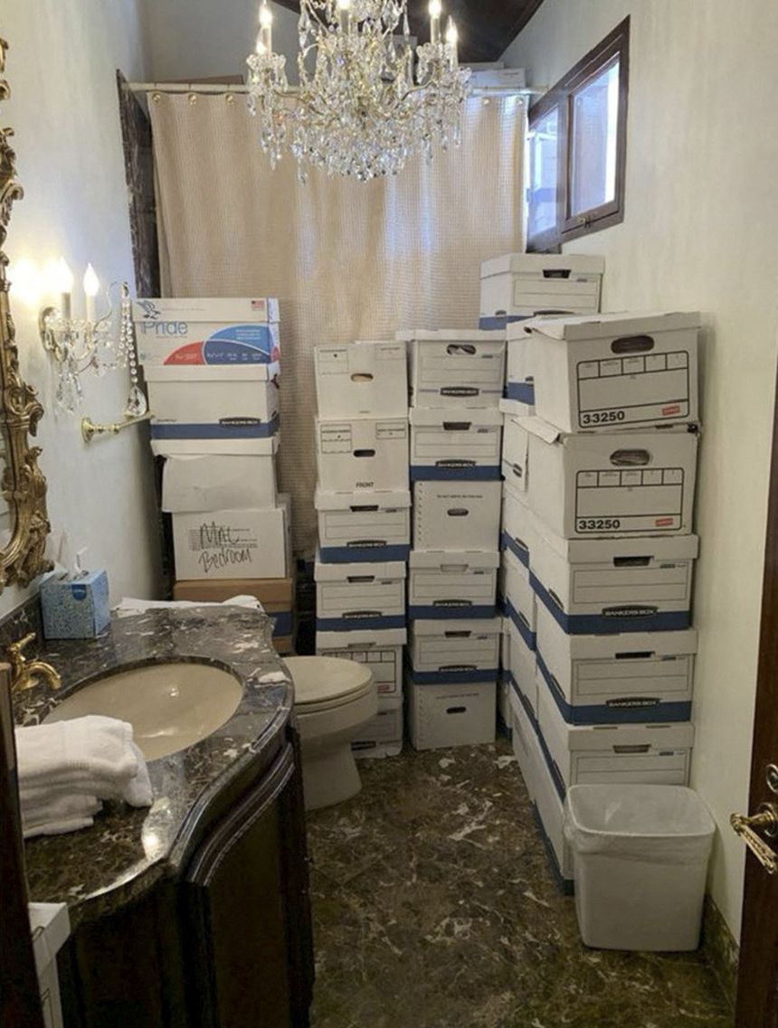 A photo published by the U.S. Justice Department in their charging document against former U.S. President Donald Trump shows boxes of documents stored in a bathroom at Trump's Mar-a-Lago club in Florida in early 2021 as seen embedded in the document released by the Justice Department in Washington, U.S. June 9, 2023.  U.S. Justice Department/Handout via REUTERS     TPX IMAGES OF THE DAY