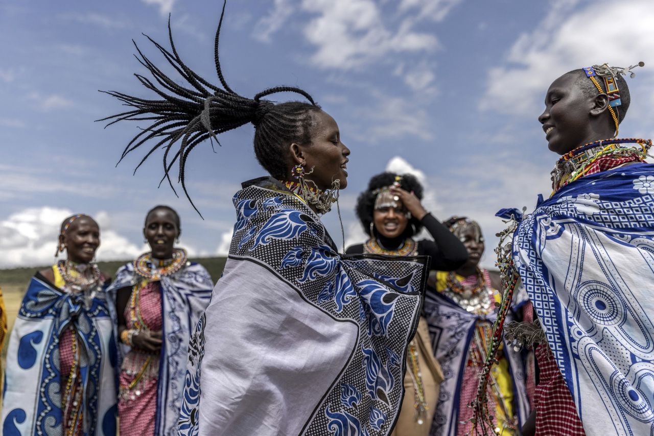 Maasai women sing traditional songs during a Maasai cultural festival in Sekenani, Kenya, on Saturday, June 10.